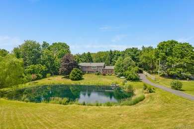 Tucked away in a private, park-like setting, this stunning - photo 1
