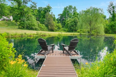 Tucked away in a private, park-like setting, this stunning - photo 2