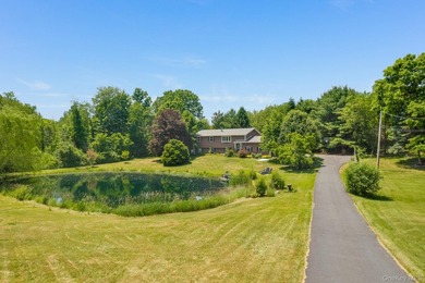Tucked away in a private, park-like setting, this stunning - photo 4