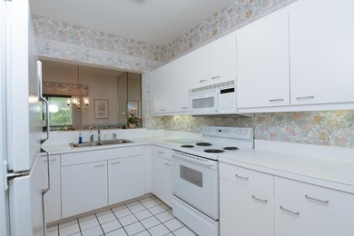 This three-bedroom, three-bath residence is priced to sell and - photo 5