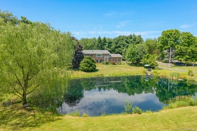 Tucked away in a private, park-like setting, this stunning - photo 5