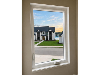 Lake views and wooded privacy come together in this - photo 6