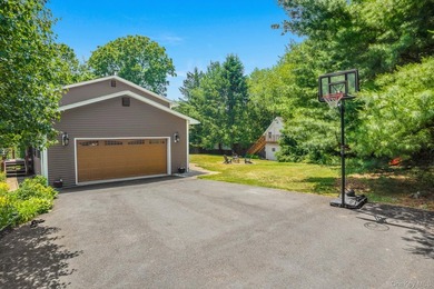Tucked away in a private, park-like setting, this stunning - photo 6