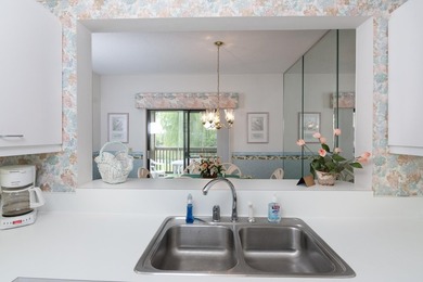 This three-bedroom, three-bath residence is priced to sell and - photo 7