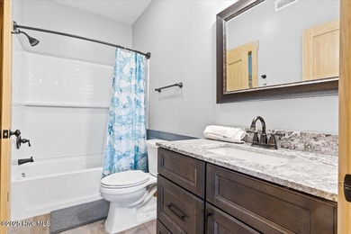 Welcome to 25 Grand View Drive, a stunning custom-built 2023