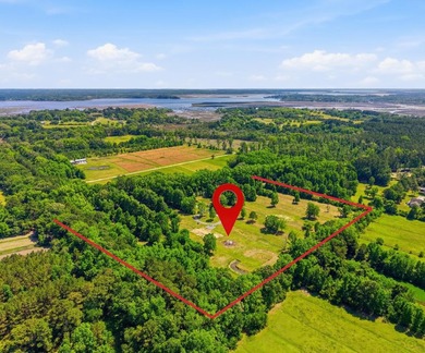 Welcome to this expansive 12.25-acre property in the heart of - photo 1