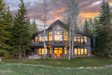 This charming home is perfectly situated overlooking the - photo 1