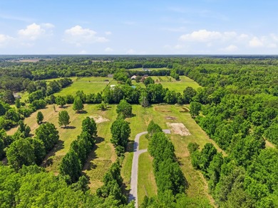 Welcome to this expansive 12.25-acre property in the heart of - photo 2