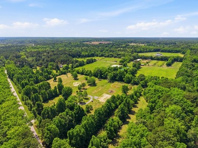 Welcome to this expansive 12.25-acre property in the heart of - photo 4