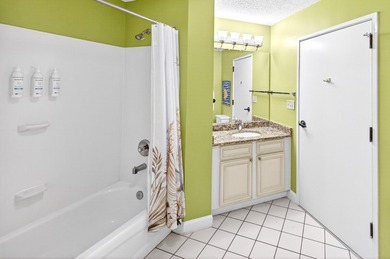 Back on the market with a new price, this Gulf-front 2-bedroom - photo 13