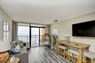 Wake up to breathtaking oceanfront views in this beautifully - photo 4