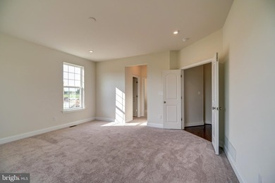 The Legend features a 1st-floor owner suite with a grand - photo 22
