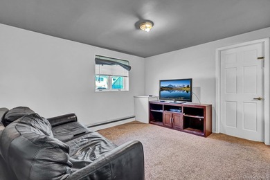Wide-Line High Ranch featuring 4-5 bedrooms, 2 Full Baths, a Den - photo 23