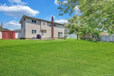 Wide-Line High Ranch featuring 4-5 bedrooms, 2 Full Baths, a Den - photo 27