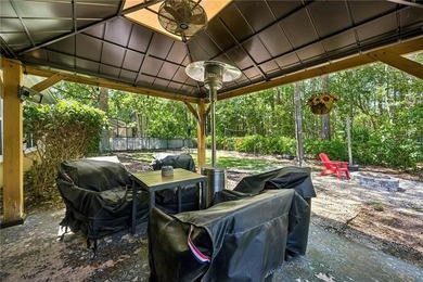 This custom-built home is situated on a private, wooded homesite - photo 44