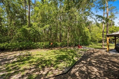 This custom-built home is situated on a private, wooded homesite - photo 53