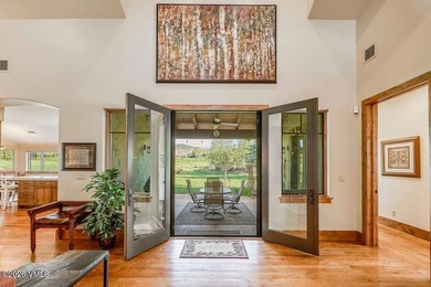 Welcome home to the coveted Eagle Ranch community, where - photo 7