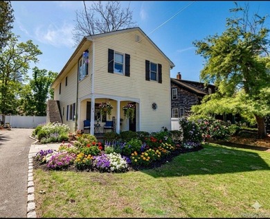 Stunning water views! This 4 bedroom, 2 full bath Colonial is - photo 1