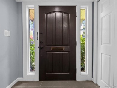 Welcome to this fully renovated ranch-style residence in the - photo 3