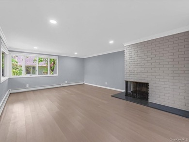 Welcome to this fully renovated ranch-style residence in the - photo 4