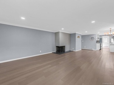 Welcome to this fully renovated ranch-style residence in the - photo 5