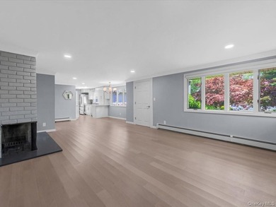 Welcome to this fully renovated ranch-style residence in the - photo 7