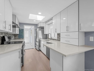 Welcome to this fully renovated ranch-style residence in the - photo 10