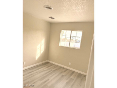 Fully remodeled corner-lot home featuring a spacious backyard