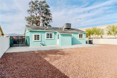 Fully remodeled corner-lot home featuring a spacious backyard
