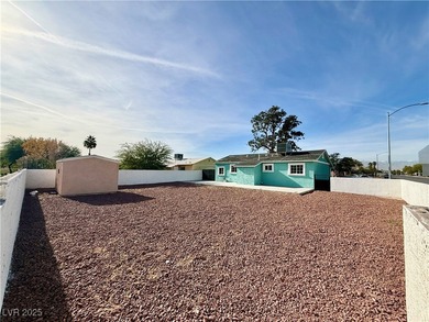 Fully remodeled corner-lot home featuring a spacious backyard