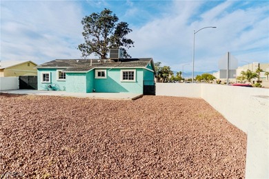 Fully remodeled corner-lot home featuring a spacious backyard
