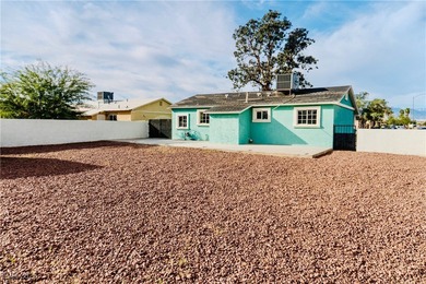 Fully remodeled corner-lot home featuring a spacious backyard