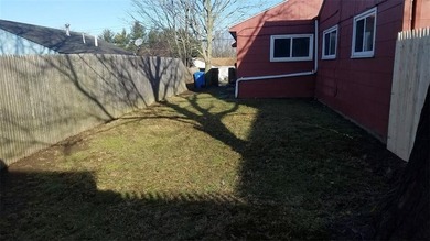 This side-by-side duplex, situated on a desirable corner lot in - photo 9
