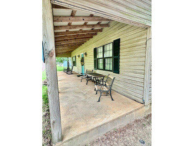 Nestled on the shoreline of Lake Seminole, this charming 2 - photo 2