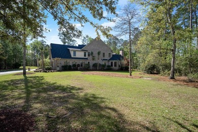 This exquisite, move-in-ready estate is perfectly situated on a - photo 7