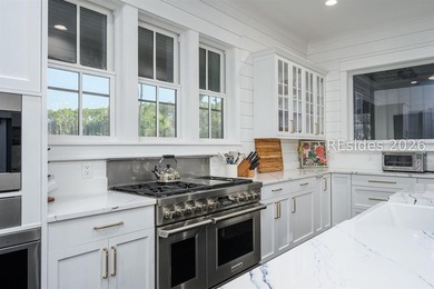 Gracefully positioned on a half-acre homesite overlooking one of - photo 13