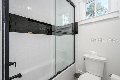 Gracefully positioned on a half-acre homesite overlooking one of - photo 26