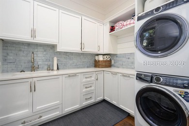 Gracefully positioned on a half-acre homesite overlooking one of - photo 31