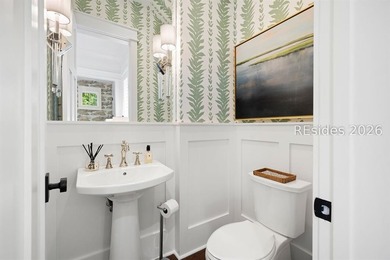 Gracefully positioned on a half-acre homesite overlooking one of - photo 32