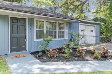 NEWLY REMODELED HOME WITH TWO GARAGES!Welcome to this charming - photo 1