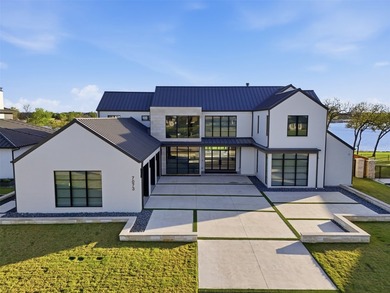 Embrace the tranquility of lakeside living with this brand-new - photo 1