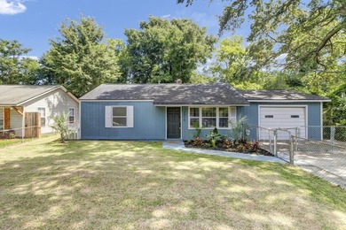 NEWLY REMODELED HOME WITH TWO GARAGES!Welcome to this charming - photo 2