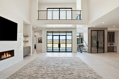 Embrace the tranquility of lakeside living with this brand-new - photo 4