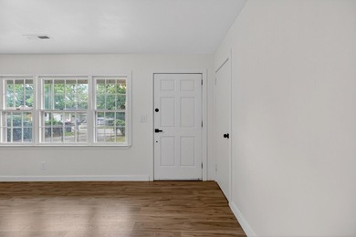 NEWLY REMODELED HOME WITH TWO GARAGES!Welcome to this charming - photo 5