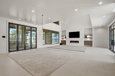 Embrace the tranquility of lakeside living with this brand-new - photo 5