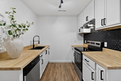 NEWLY REMODELED HOME WITH TWO GARAGES!Welcome to this charming - photo 8