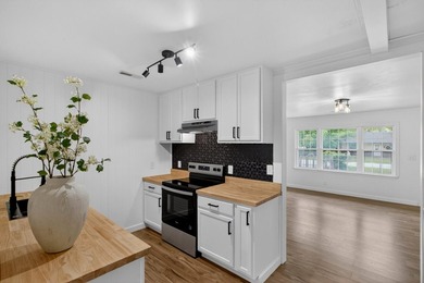 NEWLY REMODELED HOME WITH TWO GARAGES!Welcome to this charming - photo 10