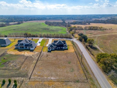Experience luxury living on a picturesque corner acre in the - photo 3