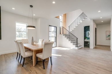 Experience luxury living on a picturesque corner acre in the - photo 8