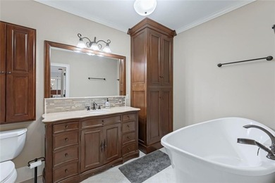 Nestled on a private cul-de-sac within the prestigious gates of - photo 34